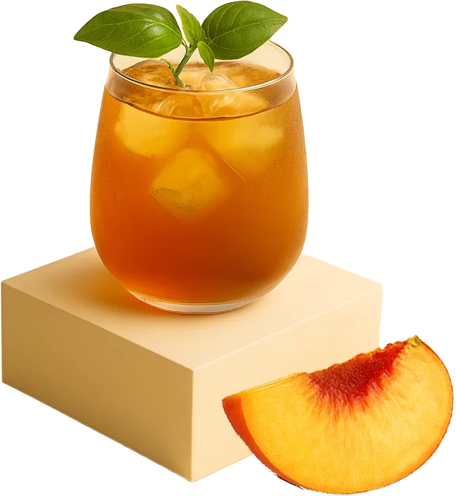 A refreshing glass of iced peach oolong tea topped with fresh leaves, placed on a beige podium with a peach slice beside it.