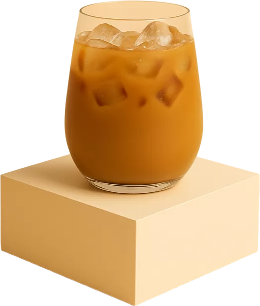 a glass of iced sea salt caramel latte with ice cubes placed on a podium against a plain beige background