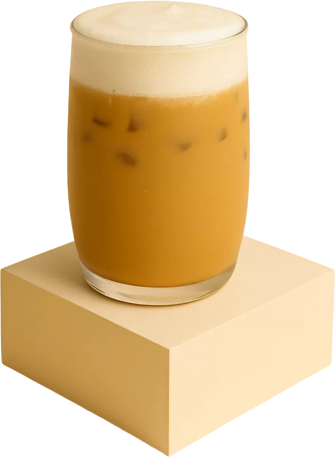 A glass of iced toffee latte topped with creamy foam, placed on a beige podium with a smooth and premium