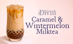 Caramel and wintermelon milktea in a tall round bottom glass with brown sugar pearls and caramel drizzle over ice